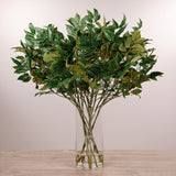 Artificial Ming Aralia Arrangement in Glass Vase